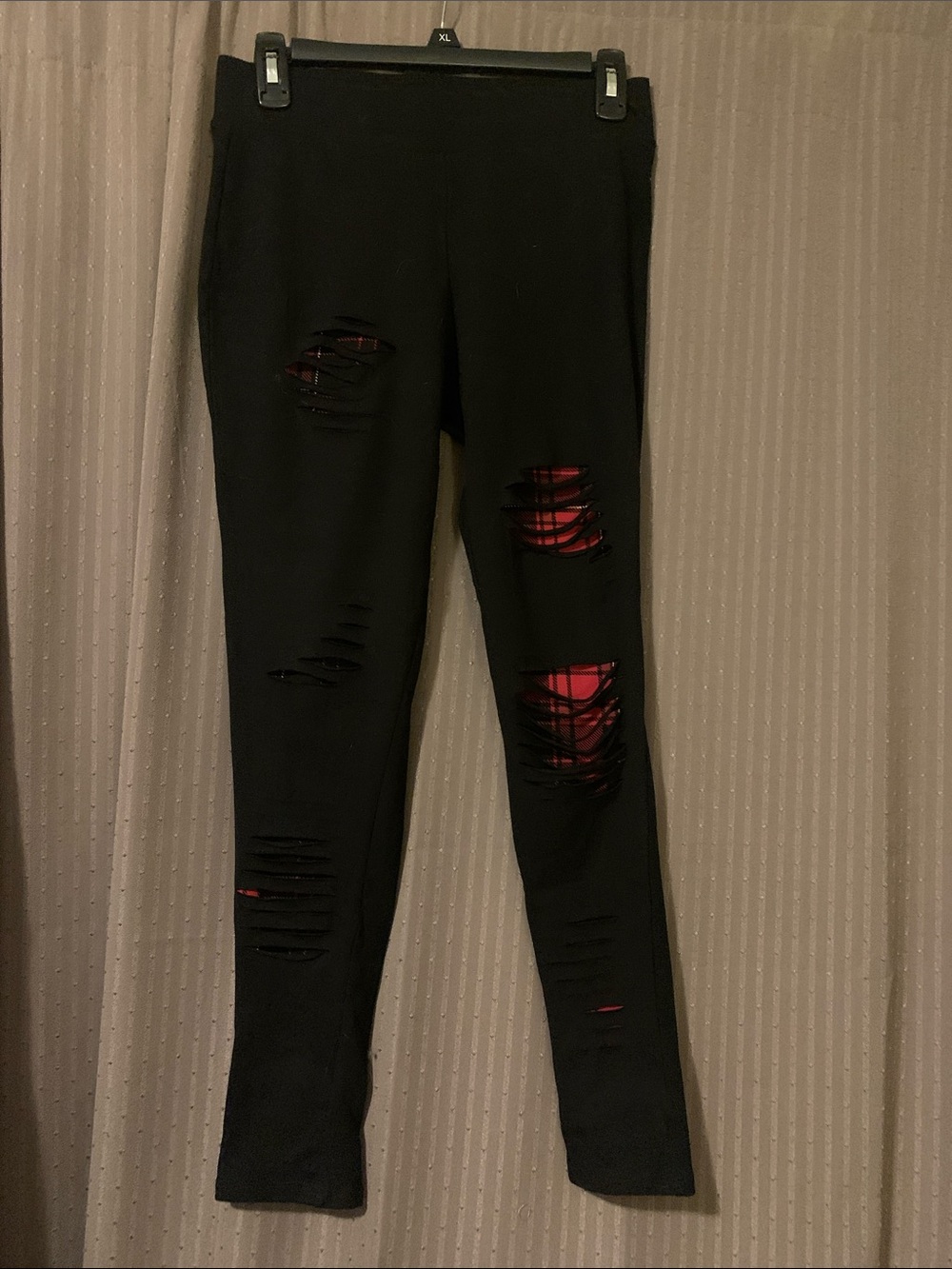 Torrid Black Distressed Leggings with Red Underlay. Size 00